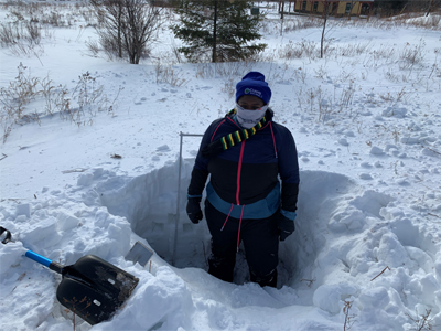 Jullian Williams in snow pit