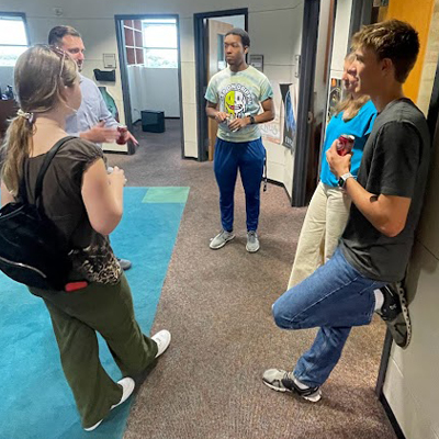 students standing and talking