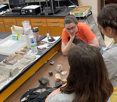 students looking at rocks