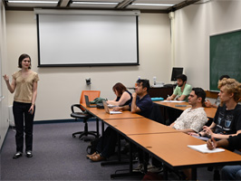 Olivia Aubone lecturing Olivia Aubone, Claire Walton,José Morales, McCrea Black, Aleck Nash, Nick Stipanovic