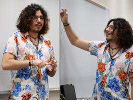Luca Iovino lecturing and writing on white board