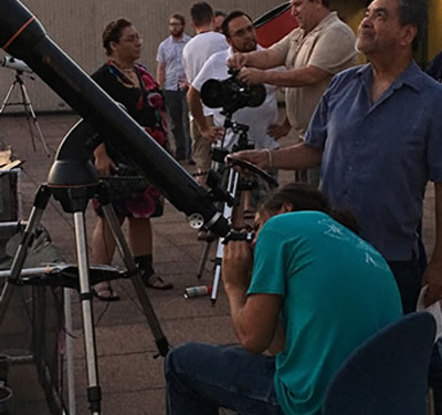 looking at sky with telescope