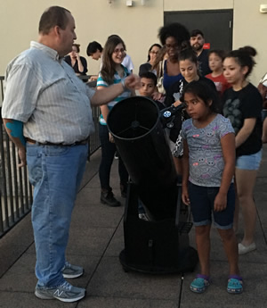 students and telescope