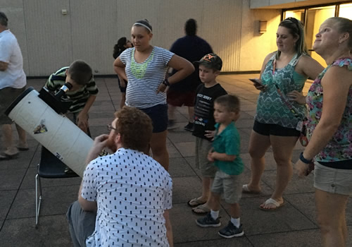 students and telescope