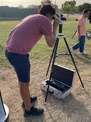 looking through telescope