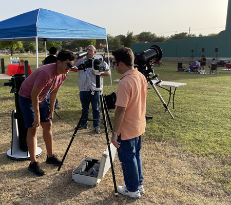 looking through telescope