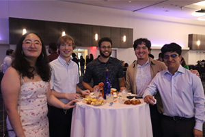 group standing at table