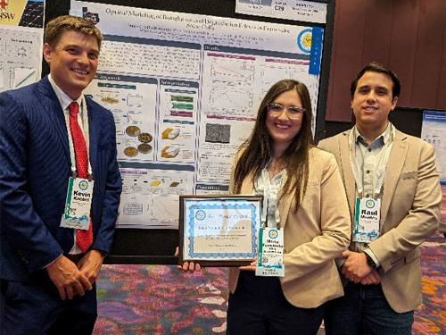 Kevin Knebel, Maria Fernanda Villa Bracamonte, and Jose Raul Montes Bojorquez in front of poster