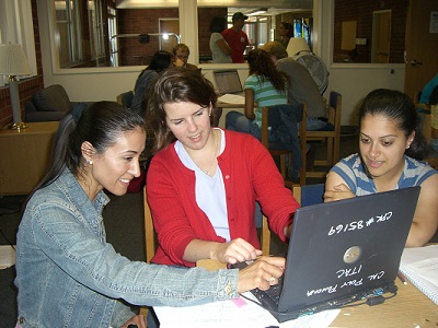 Erika mentoring two AMSSI students
