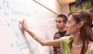 Erika and student at whiteboard