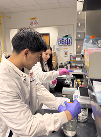 two students working in lab
