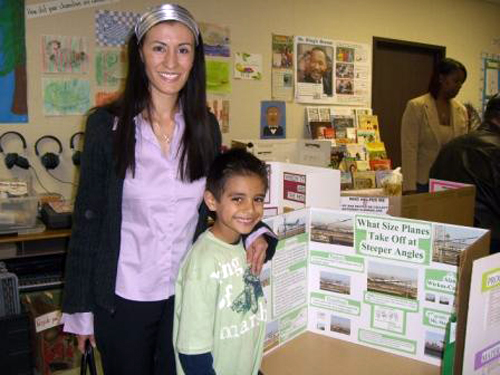 Erika and child at science fair