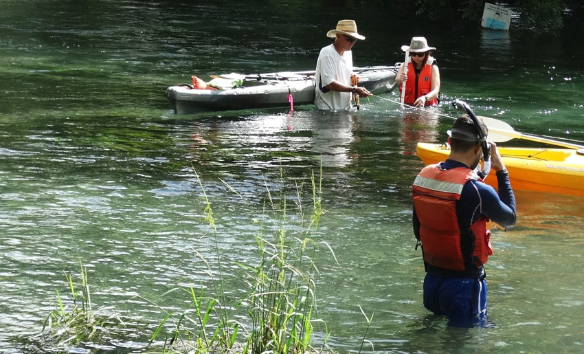 people in river