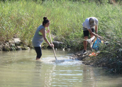 students in creek