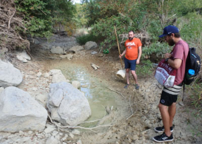 students in creek