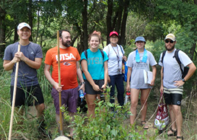 students in creek