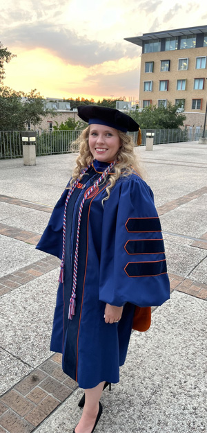 Tara Flaugher in cap and gown