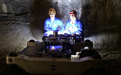 research team in cave