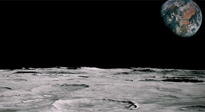 moon surface with earth in background