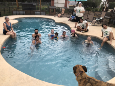 faculty and students in the pool