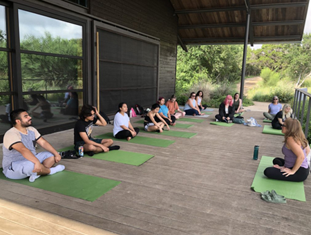 students doing yoga