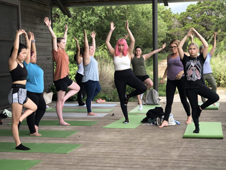 students doing yoga