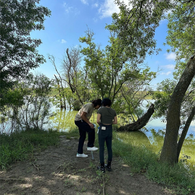 students in wooded area