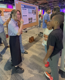 Tia Kline presenting a poster