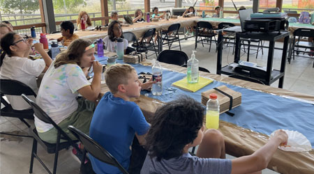 campers making insect boxes