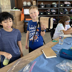 campers making insect boxes