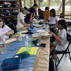 campers making insect boxes