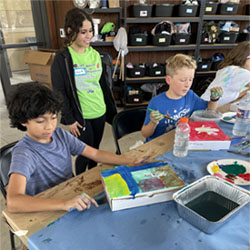 campers making insect boxes