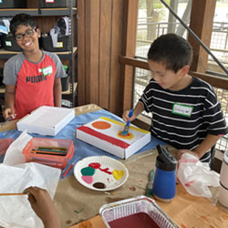 campers making insect boxes