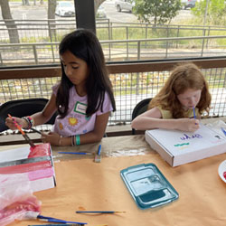 campers making insect boxes