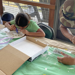 camper making insect box