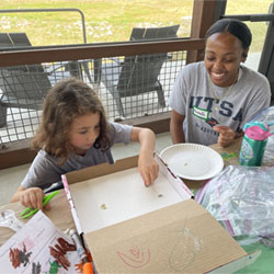 camper making insect box