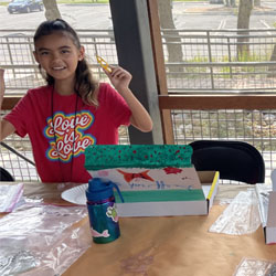 camper making insect box