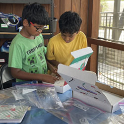 campers making insect boxes