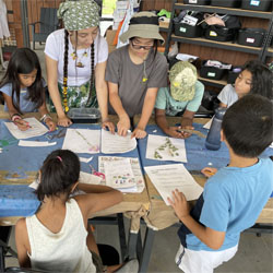 campers working with leaves