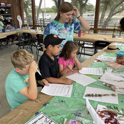 campers working with leaves