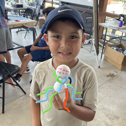 camper displaying insect model