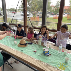 campers making bead key chains