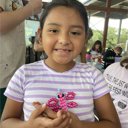 camper displaying bead key chain