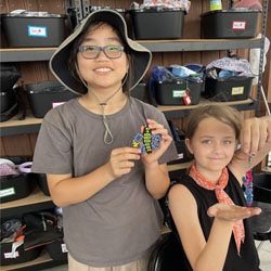 campers displaying bead key chains