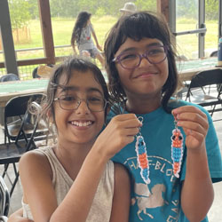 campers displaying bead key chains