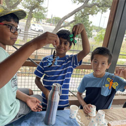 campers displaying bead key chains