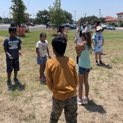 campers playing with water balloons