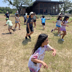 campers playing with water balloons