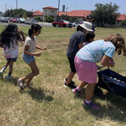 campers playing with water balloons