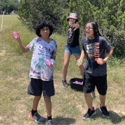 campers playing with water balloons